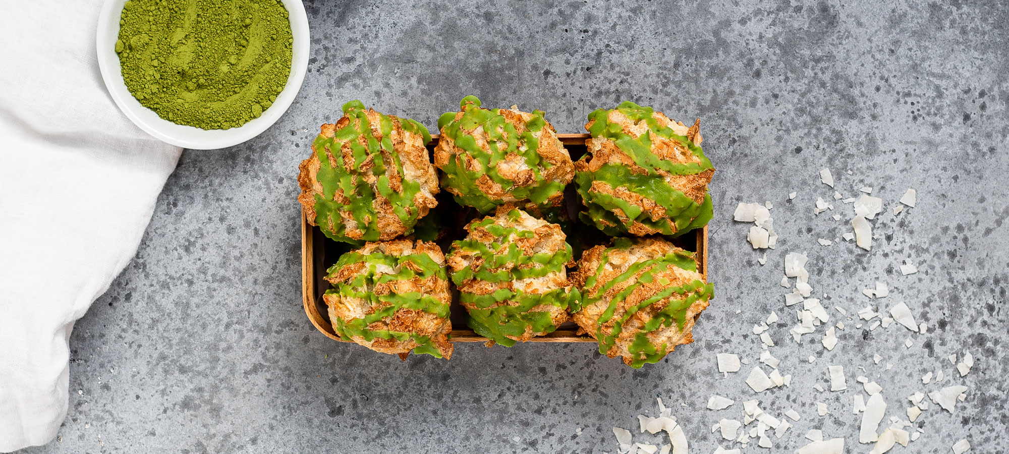 Coconut macaroons with matcha drizzle
