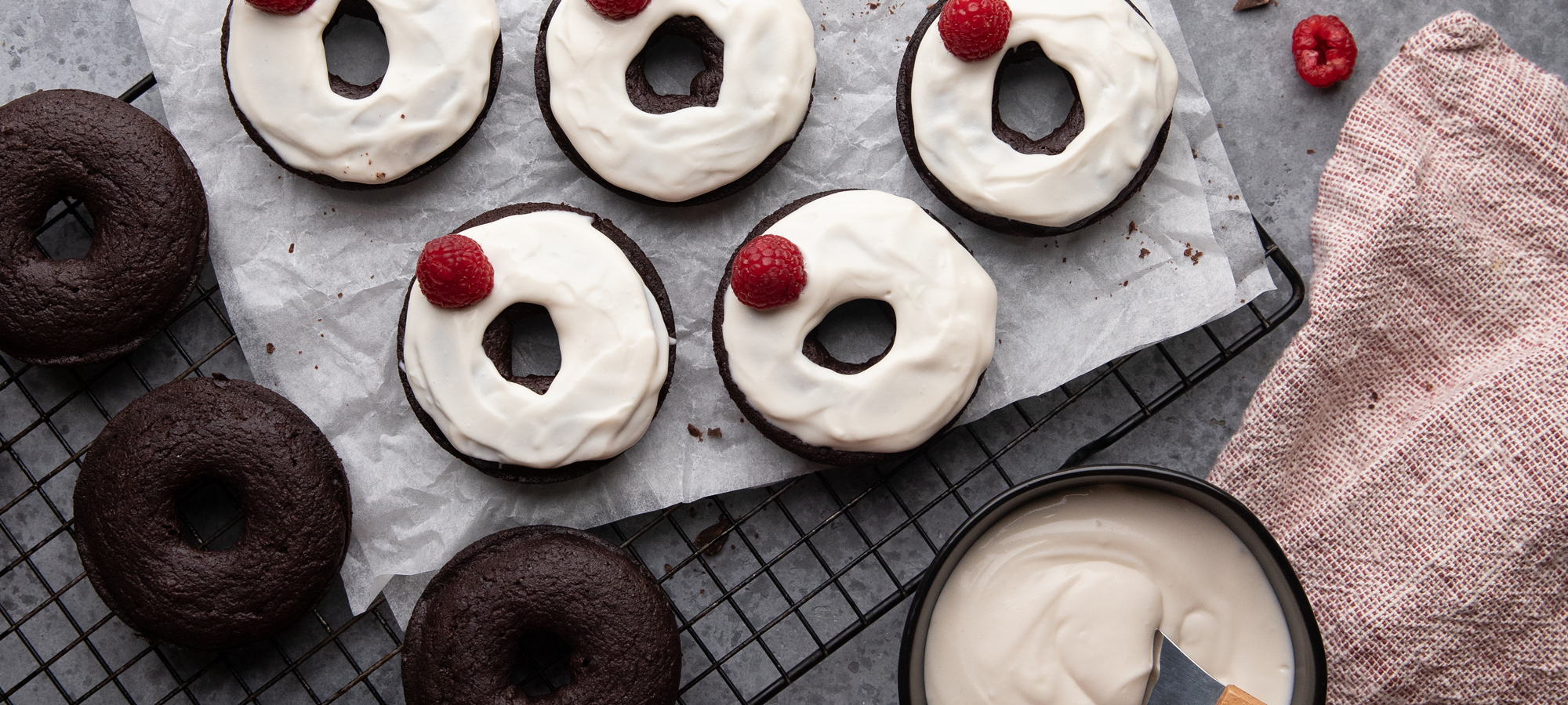 Chocolate donuts with cream cheese frosting