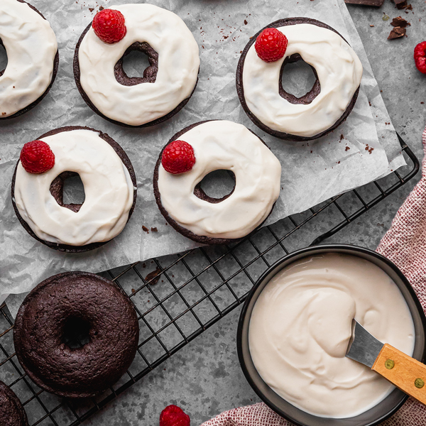 Chocolate donuts with cream cheese frosting