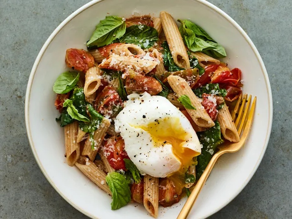 Enjoy your carbs on a high protein diet by adding a soft poached egg to a hearty bowl of penne.