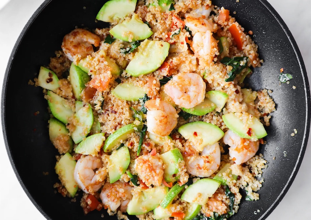 Shrimp and quinoa serve as a filling protein-packed Mediterranean dish.
